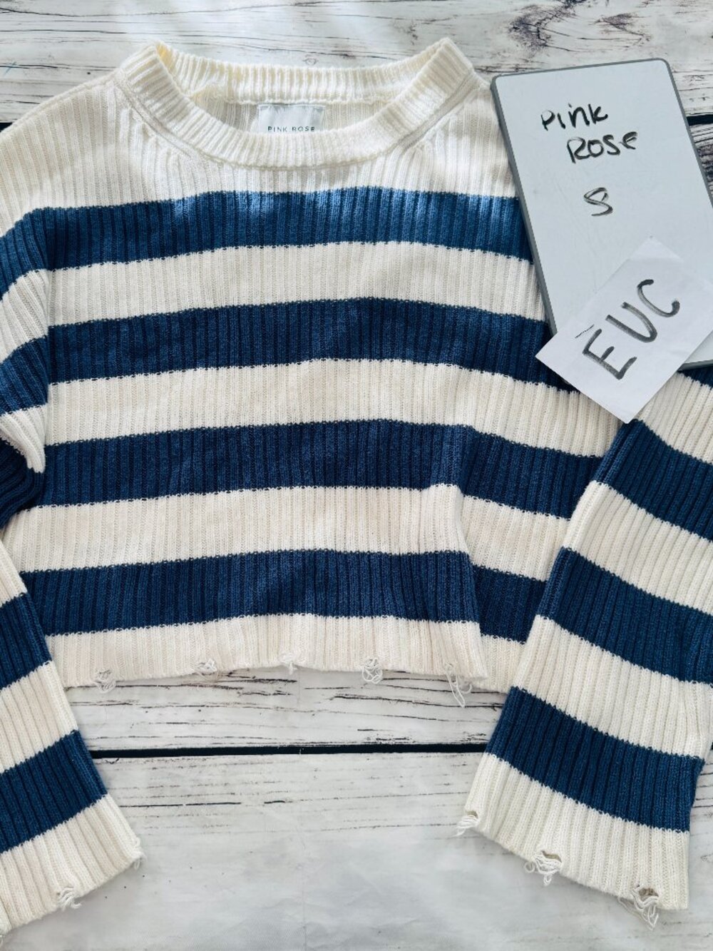 Size s striped distressed sweater